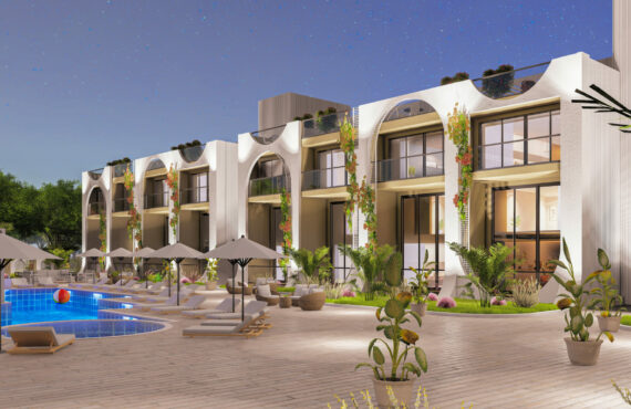 Tauchen Sie ein in eine Welt des Luxus in Bahceli, wo FENERCIOGLU ein modernes Wohnprojekt auf einer Fläche von 6.000 m2 präsentiert. Mit nur 24 angebotenen Apartments ist Exklusivität vom Feinsten. Wählen Sie zwischen Studioräumen, 1+1- oder 2+1-Konfigurationen, die jeweils auf unterschiedliche Lebensstile zugeschnitten sind – sei es Garten-, Loft- oder Terrassenwohnungen. Jedes Apartment ist so gestaltet, dass es den faszinierenden Meerblick einfängt und dafür sorgt, dass die Bewohner jeden Tag mit dem ruhigen Rauschen der Wellen aufwachen. Parkprobleme gehören der Vergangenheit an, da innerhalb des Komplexes eigene Parkplätze vorhanden sind. Und mit einer professionellen Verwaltungsgesellschaft an der Spitze können sich die Bewohner auf ein reibungsloses Leben verlassen. Aber es sind die Annehmlichkeiten, die diese Investition in Nordzypern wirklich auszeichnen. Gönnen Sie sich erholsame Sitzungen in der Sauna oder kommen Sie im hochmodernen Fitnesscenter ins Schwitzen. Der Ruheraum bietet den perfekten Rückzugsort, während die Vitaminbar dafür sorgt, dass Sie immer in Topform sind. Tauchen Sie ein in den atemberaubenden Infinity-Pool oder entspannen Sie einfach am dekorativen Pool. Für kulinarische Abende wartet der Grillplatz. Schlendern Sie durch wunderschön angelegte Spazierwege, tauchen Sie ein in die Ruhe des Botanischen Gartens oder vergnügen Sie sich auf dem Kinderspielplatz und auf dem Sportplatz. Wenn Sie ein Haus in Nordzypern kaufen möchten, definieren diese Bahceli-Apartments luxuriöses Wohnen neu. Sichern Sie sich jetzt Ihr Traumhaus und erleben Sie die besten Apartments in Nordzypern.